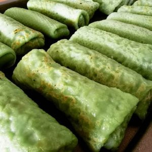 Kuih Dadar (Pandan crepe with brown sugar and desiccated coconut filling)